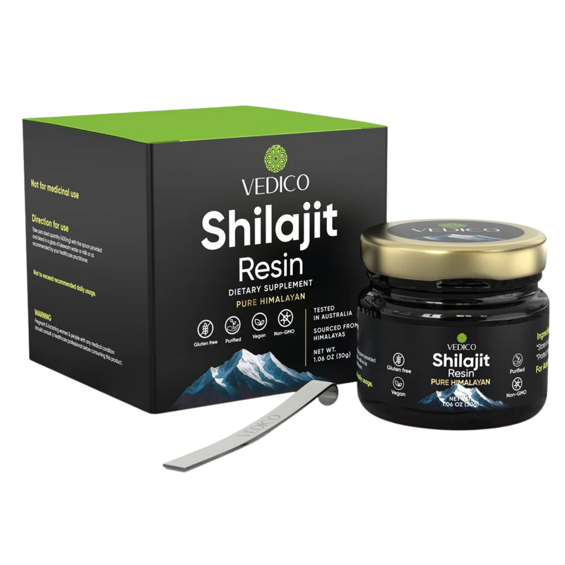 Vedico Shilajit Resin dietary supplement shown with a black and green product box, a black jar with a gold lid, and a small metal scoop on a white background.